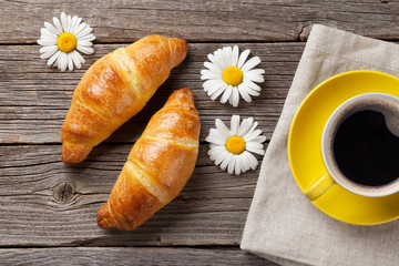 Croissants and coffee cup