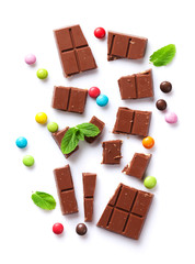 Broken chocolate bar and candies