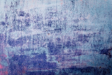 Wall fragment with scratches and cracks