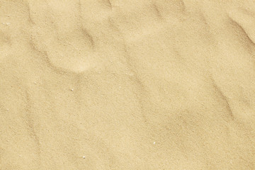 Fototapeta na wymiar Sunny surface of sand