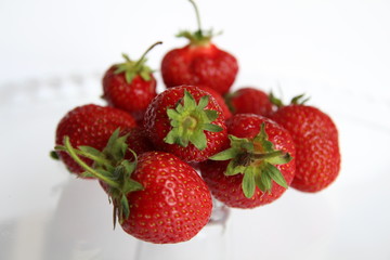 Strawberries with leaves.