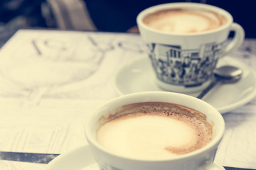 Pair of coffee cups.