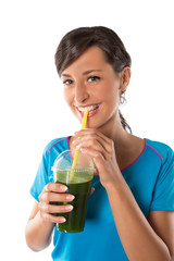 Woman drinking vegetable smoothies.