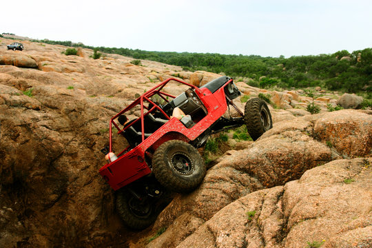 Red Jeep 4x4 rock crawling