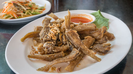 Fried fish on dish