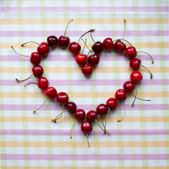 cherries in a heart-shaped bowl