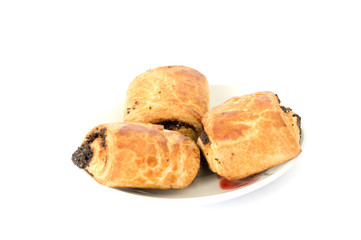 pies with poppy out of puff pastry isolated on white background