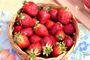 Bright fresh strawberry in a round container