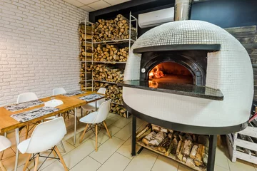Velvet curtains Pizzeria wood fired pizza stove in restaurant