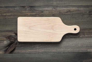 cutting board on wooden table