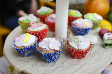 Served festive candy bar table with cupcakes