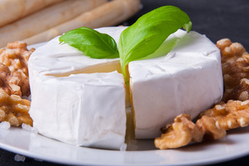 Blue cheese and camembert on plates