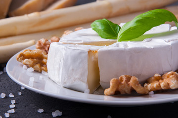 Blue cheese and camembert on plates