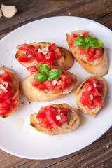 Bruschetta with tomato, onion and basil
