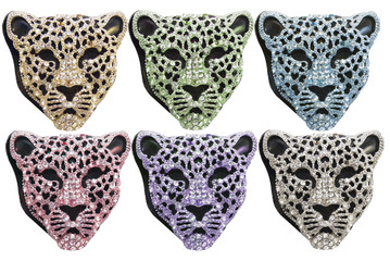 Isolated tiger brooch photo. Isolated multicolored tiger face brooch photo.