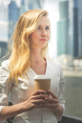 girl with coffee to go