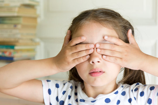 Child Little Girl Covering Her Eyes With Hands