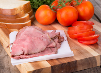 Roast Beef Sandwich Ingredients on a Cutting Board