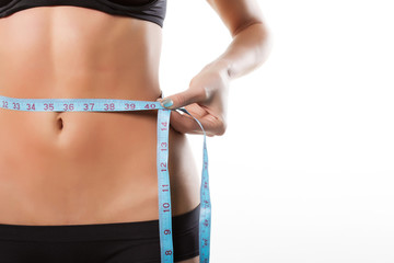 Woman measuring perfect shape of beautiful hips. Healthy lifesty