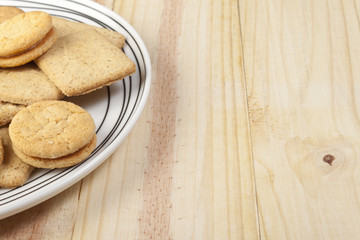 Plate of assorted biscuits on a pine country table