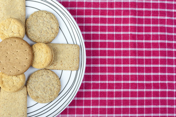 Plate of biscuits on a red and white napkin