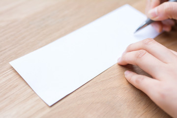 Obraz premium businessman writing on white paper
