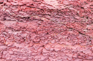 Carcked red rock surface limestone texture