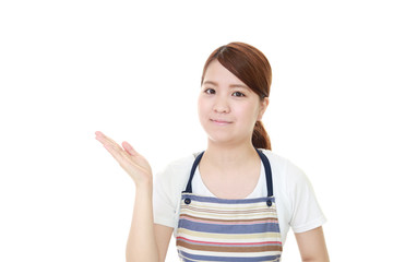 Fototapeta premium 案内する笑顔の女性