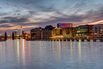 Sunset in Berlin at the River Spree with the famous television tower in the back