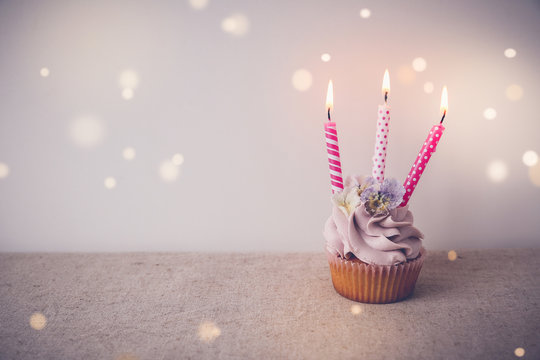 Pink And Purple Birthday Cupcake With Three Candles, Fairy Light Toning Background