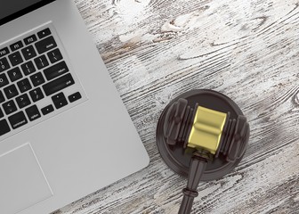 Gavel and laptop. 3d rendering.
