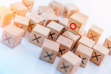 Fototapeta premium tic tac toe XO game,Wood Toys,wooden block with x and o inside creativity ideas concept