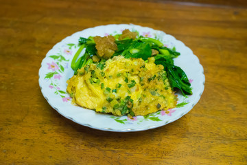 Crispy Pork with Kale ,Stir fried kale with crispy pork, omelet