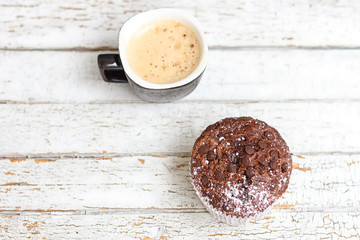 chocolate muffin and cup of coffee