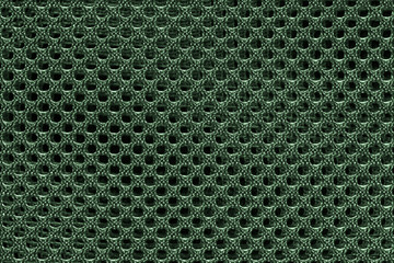 Green fishnet cloth material texture background. Nylon texture. Nylon fabric. Nylon bag for background with copy space for text or image.