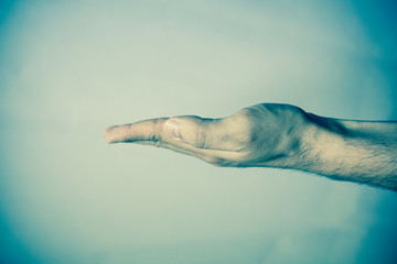 Human hand on vintage background