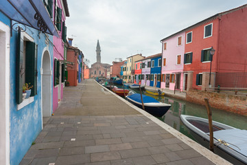 Fototapeta na wymiar view from the Burano island with its leaning bell tower, Venice