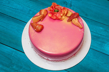 mousse cake decorated with strawberries