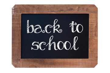 Fototapeta premium Back to school written on a vintage blackboard with wooden frame isolated on white background