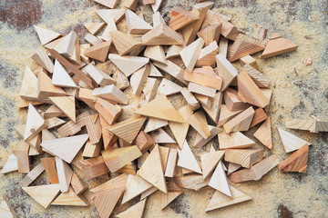Carpenter tools on wooden table with sawdust.