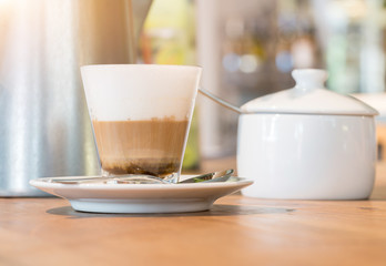 Cup of coffee on a wooden table
