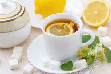 Herbal tea with linden flowers and lemon