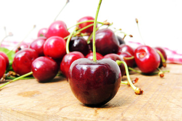 Cherries on wooden background