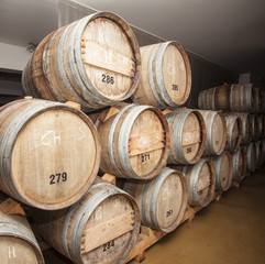 Wine barrels in cellar.