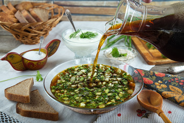 Traditional summer cold soup okroshka with kvass - obrazy, fototapety, plakaty