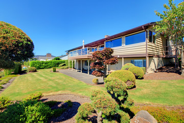 Nice backyard with space, covered patio and beautiful garden.
