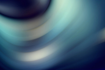 Blue gradient lines blurred in motion