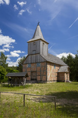 Fototapeta na wymiar Old church with wood and brick