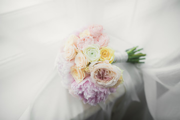 Wonderful luxury wedding bouquet of different flowers