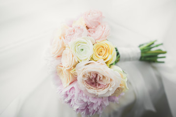 Wonderful luxury wedding bouquet of different flowers